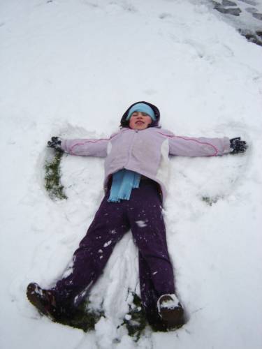 aly making a snow angel