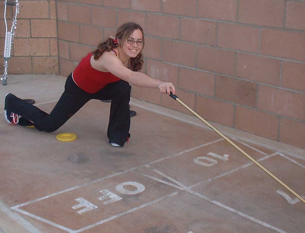 dani playing shuffleboard