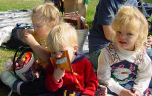 aly, toby and elizabeth check out their goody stash