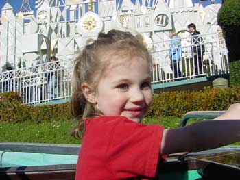 aly on her way into it's a small world