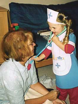 nurse aly attends to patient grammy