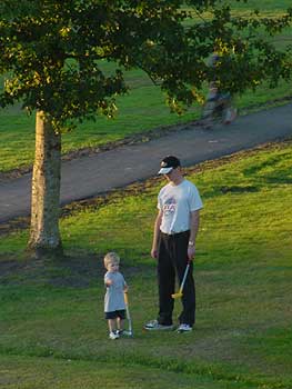 toby and daddy golfing