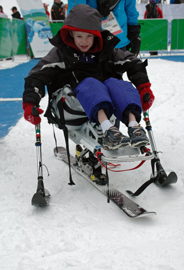 toby sit skiing