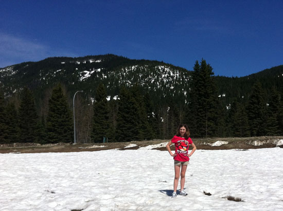 aly in her shorts and t-shirt in the snow