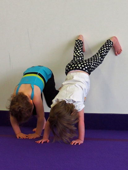 zoe learning to do a handstand