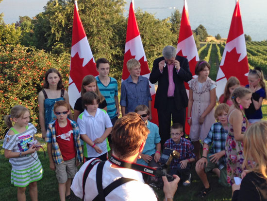 who's the kid sitting on the prime minister's foot?